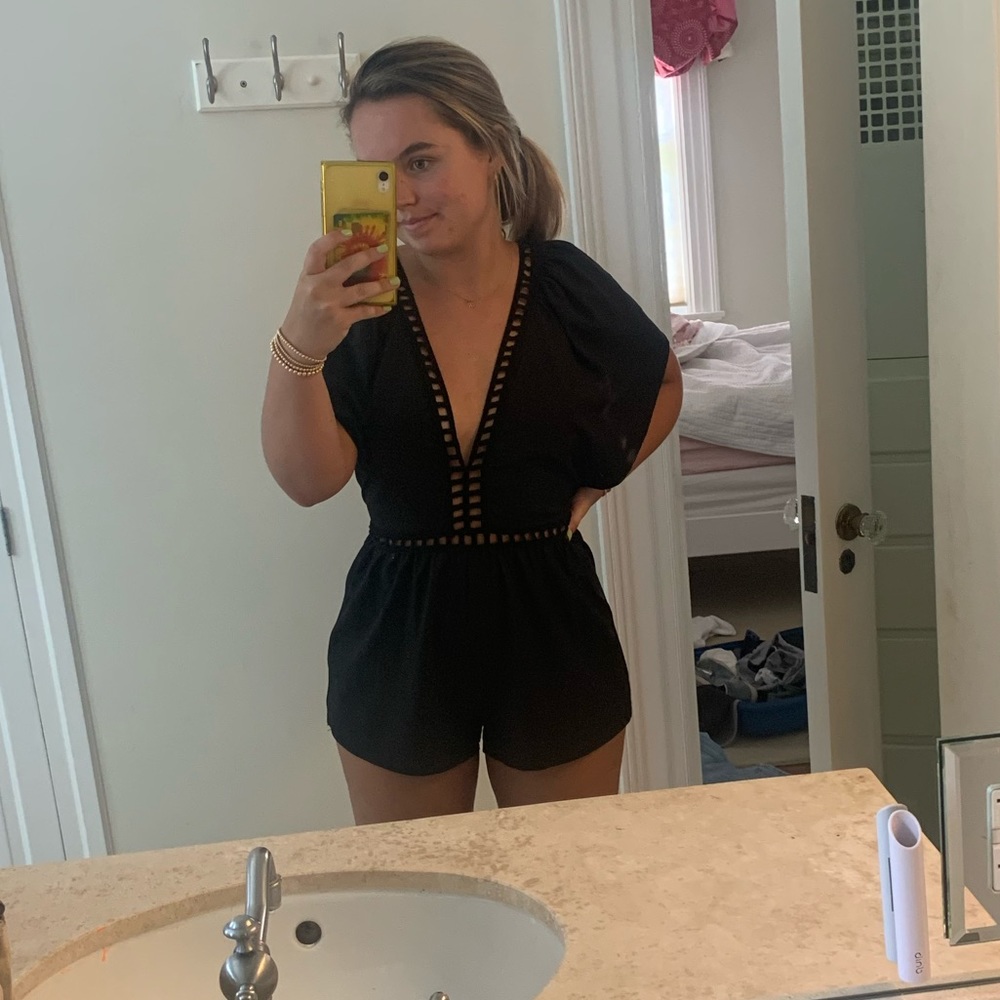 Black romper from tobi. Cut out details size small